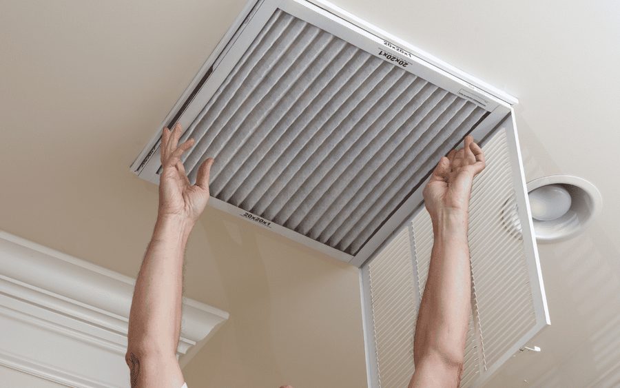 Fitting a clean air filter into a return grille