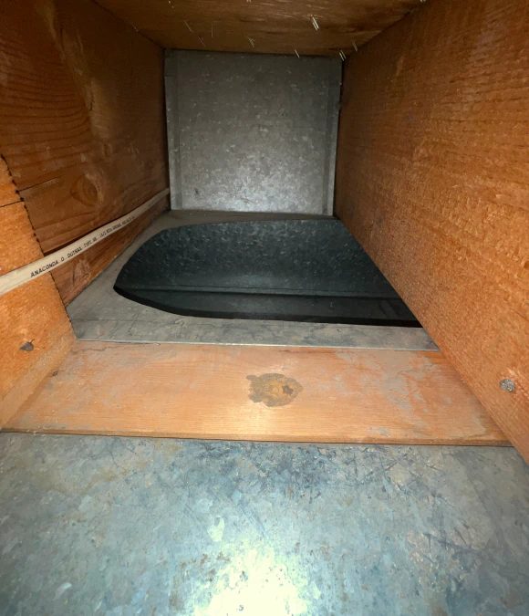 Duct interior in a multi-family unit before cleaning